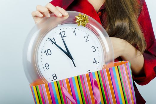 the girl with the clock. New Year's Eve
