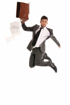 Young businessman jumping with open briefcase falling papers copy-space isolated on white background.