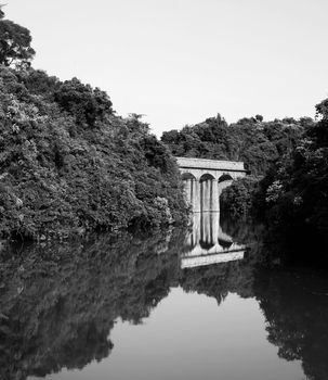 lake with stone bridge, black and white
