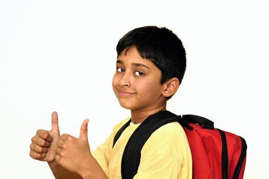 An handsome indian kid happy to go to school