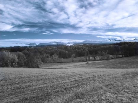 Infrared landscape in south of France with Pyrenees mountains