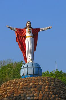 Statue of Jesus with arms extended at a loal church in Chennai India