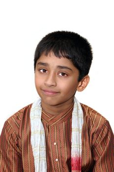 An handsome Indian kid dressed very traditionally