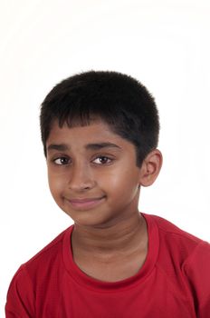 Photo of adorable young boy looking at camera