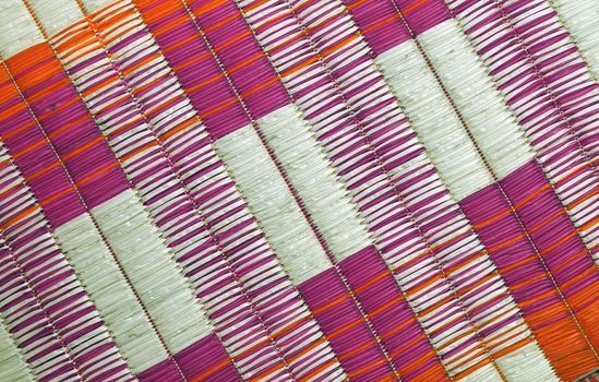 A close up shot of patterns in a jute mat