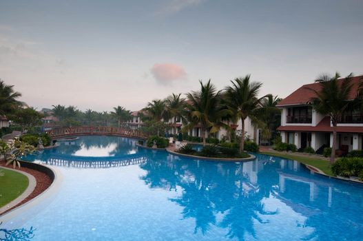 A beautiful large swimming pool at a local resort