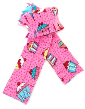 Close up of pink and multi colored cupcake themed scarf.