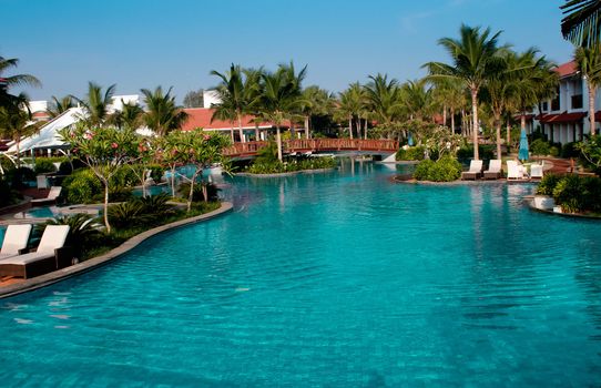 A beautiful large swimming pool at a local resort