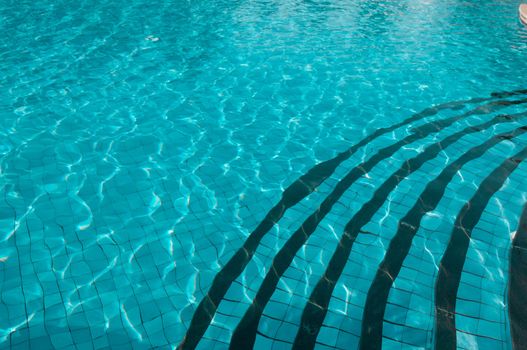 A beautiful large swimming pool at a local resort