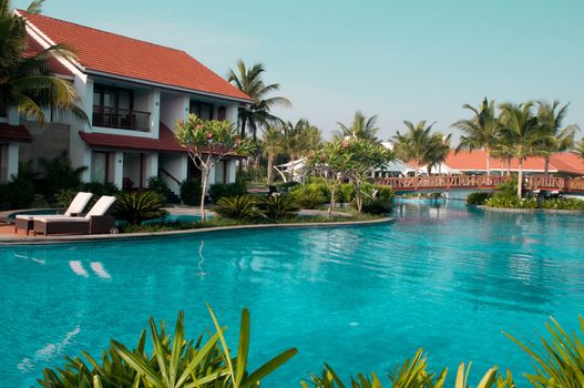 A beautiful large swimming pool at a local resort