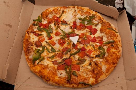 Close up photo of a fresh vegetable pizza