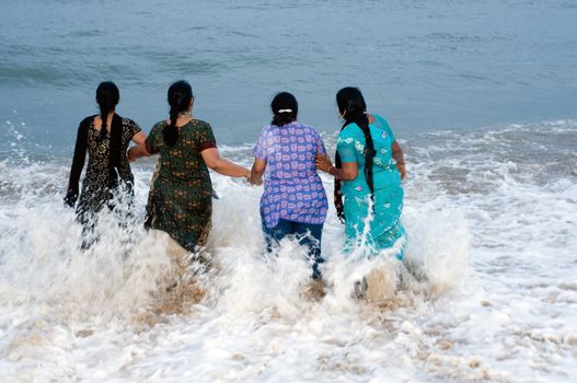 family having fun at a local beach