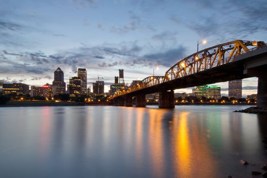 Portland Oregon Skyline and Hawthorne Bridge Over Willamette River at Sunset