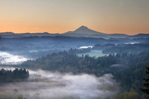 Foggy Sunrise Over Sandy River Valley and Mount Hood in Oregon