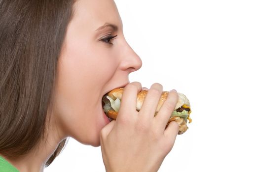 Beautiful girl eating hamburger food