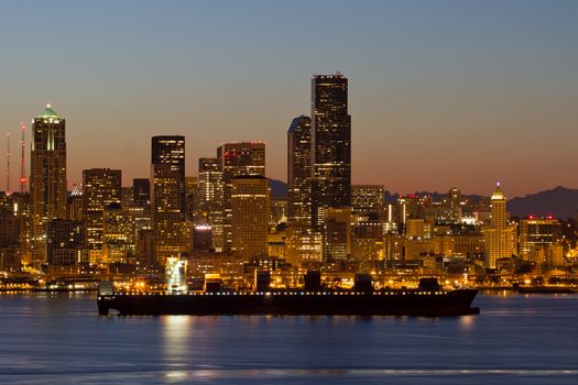 Container Ship on Puget Sound along Seattle Washington Skyline at Dawn