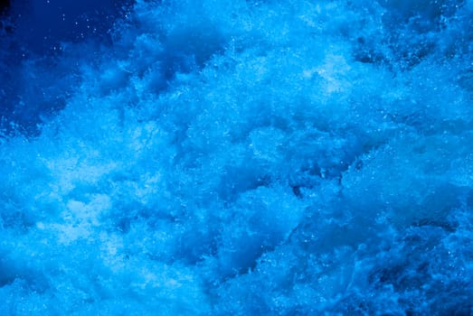 Turbulent river of ice cold blue