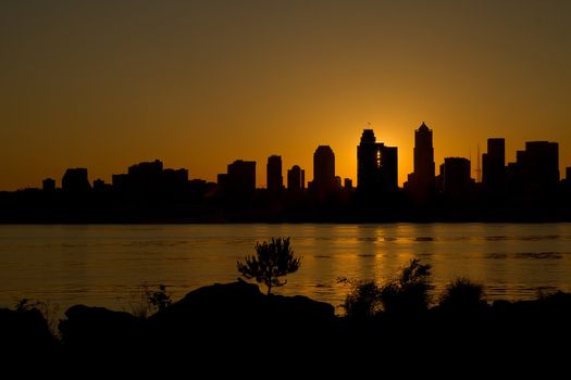 Sunrise over Seattle Washington Skyline Along Puget Sound from Alki Beach