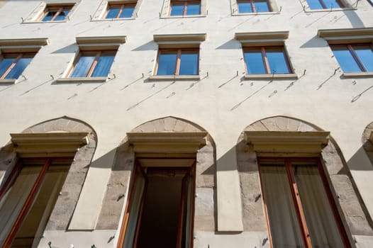 Rows of windows on building, Florence Italy