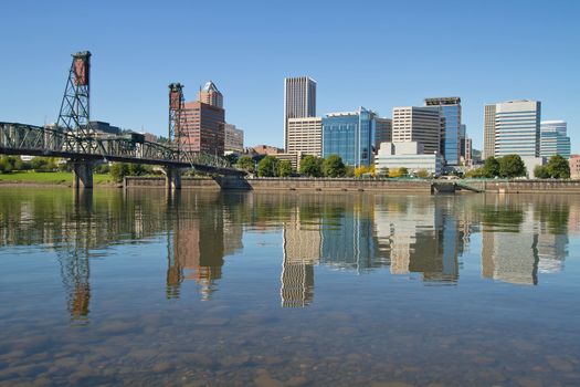 Portland Oregon Downtown Skyline and Hawthorne Bridge Reflection