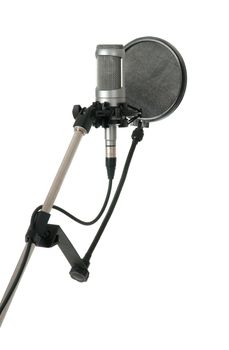 Studio microphone with pop filter, isolated on white background.