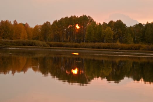 Sunset takes on a surreal feel near the forest fires