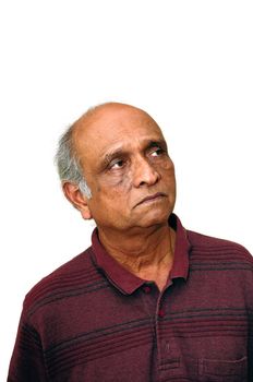 Old Indian Immigrant thinking about something very seriously