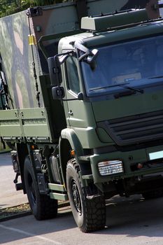 big green military truck for troop transporting
