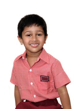 An handsome Indian immigrant kid wearing an uniform