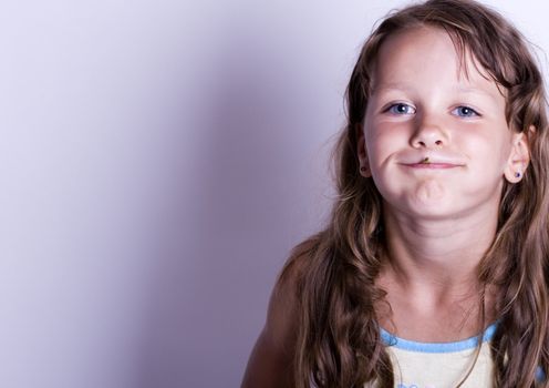 A little girl on white background