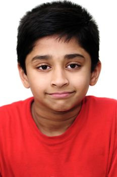 An handsome Indian kid smiling nicely for you