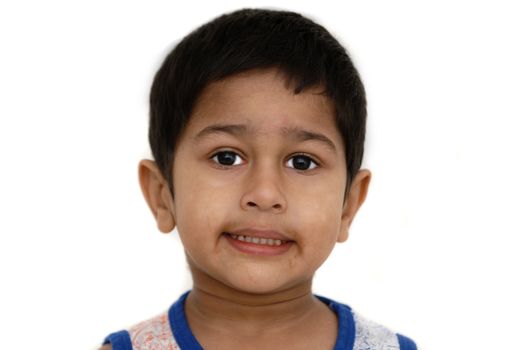 An handsome Indian kid looks very pissed off