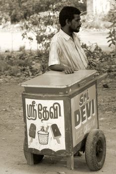 An icecream man waiting for customers in Southern India