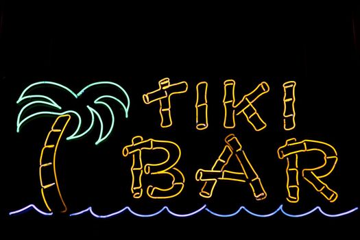 A neon sign for a Tiki Bar