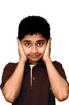 An handsome Indian kid looking very stubborn