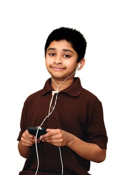 An handsome Indian kid listening to music happily