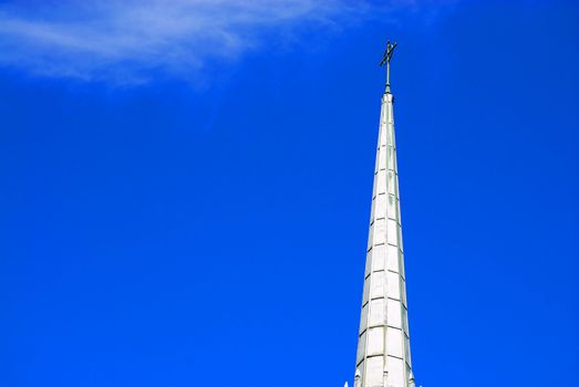 A roman catholic church on a bright sunny day with copyspace