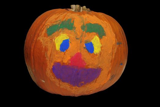 Big Halloween pumpkin painted with bright colors