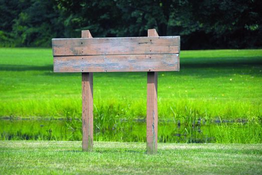 A blank wooden sign ready for your text