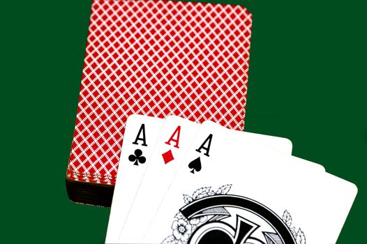 Three Aces signifying winning cards at poker