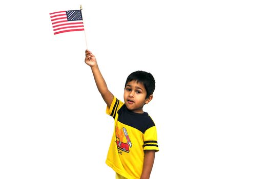 An handsome kid holding an american flag