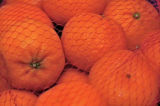 A bunch of ripe oranges ready to sell