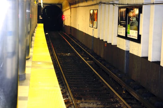 A metro sub way track on a dark night