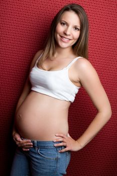 Beautiful smiling young pregnant woman