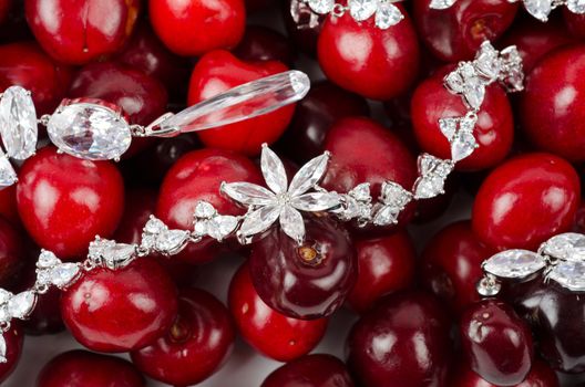 Jewels at fruit red ripe cherries berry background