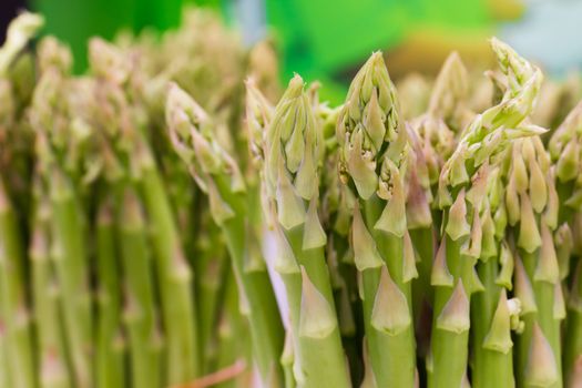 Image of a close-up of asparagus stalks in market