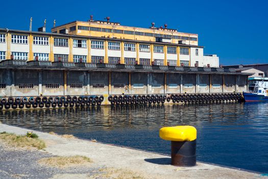 Old stores on a dock in harbor
