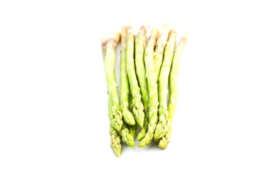 Green asparagus on white background