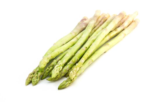 Green asparagus on white background