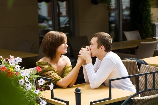 Happy young couple spending time together outdoors